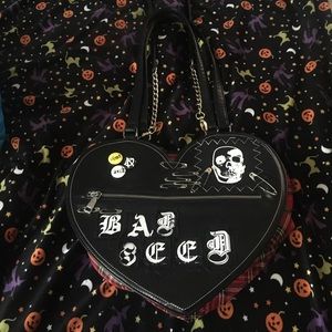 Dolls Kill “Bad Seed” Faux Leather Purse